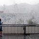 A child reacts after a big wave on a waterfront as Typhoon Hato hits Hong Kong, China August 23, 2017. REUTERS/Tyrone Siu TPX IMAGES OF THE DAY - RTS1CWRT